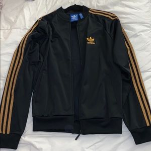 Adidas Women’s Jacket in black and gold